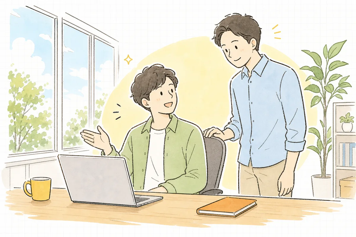 朝のオフィスで、画面を指しながら同僚と落ち着いて話している開発者